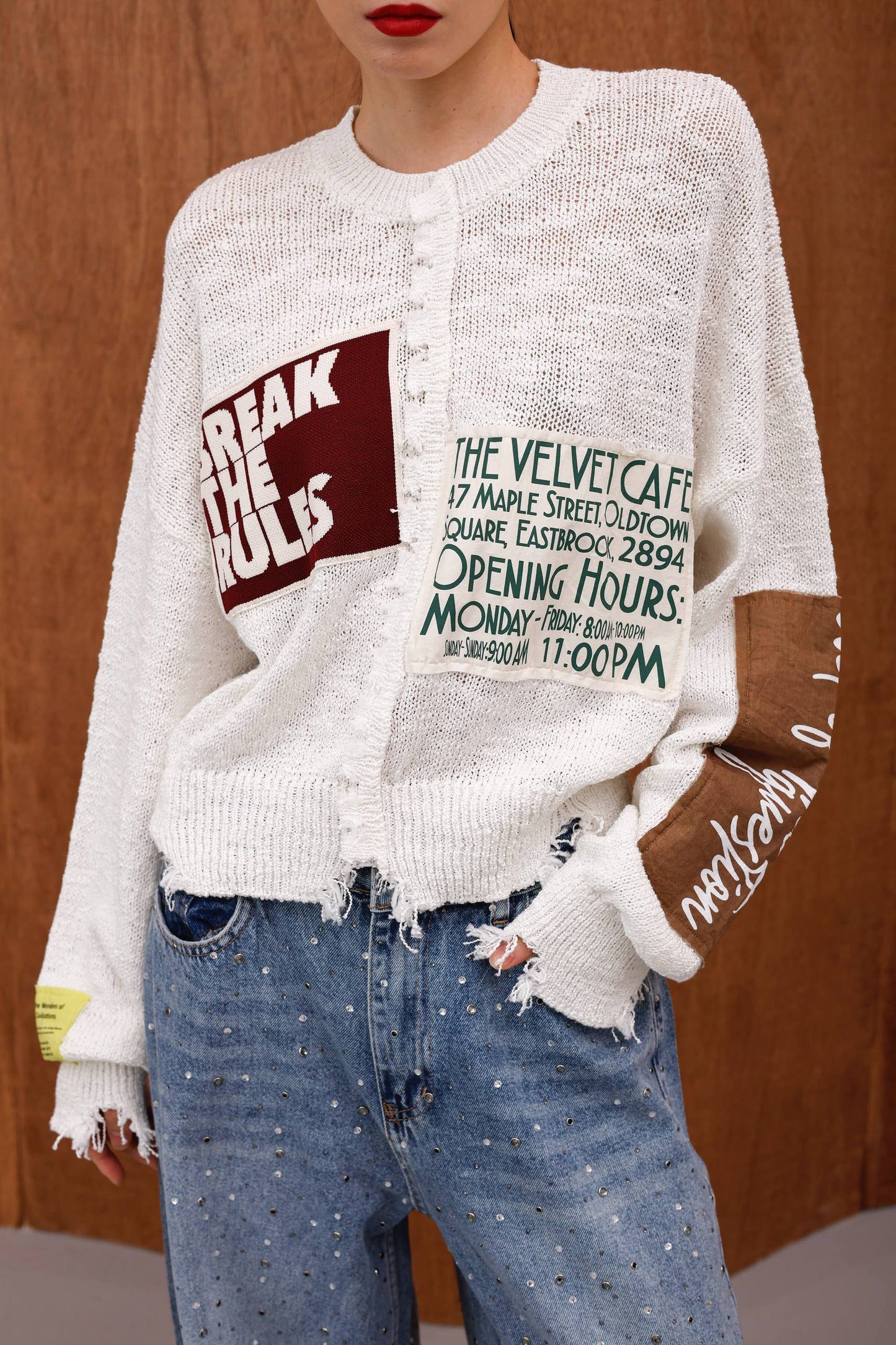 SWEATER WITH PATCHES