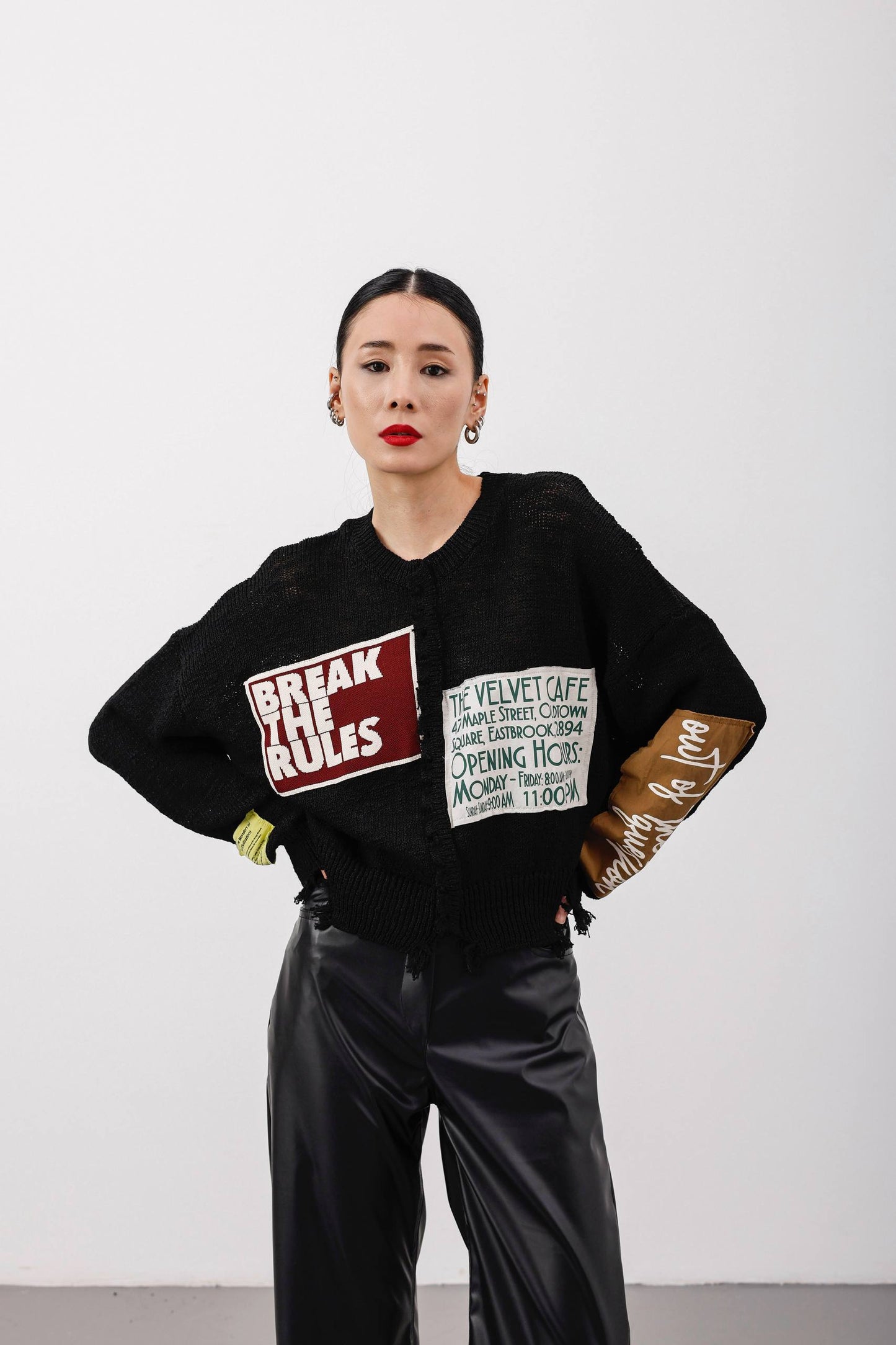 SWEATER WITH PATCHES