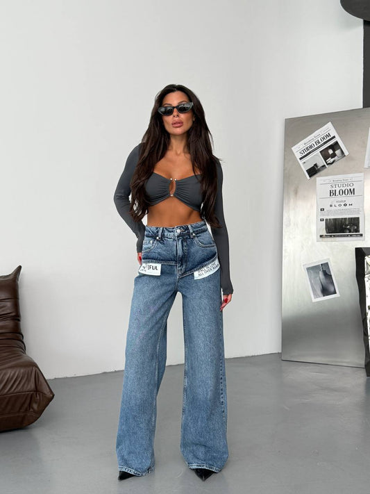 JEANS WITH WHITE POCKETS