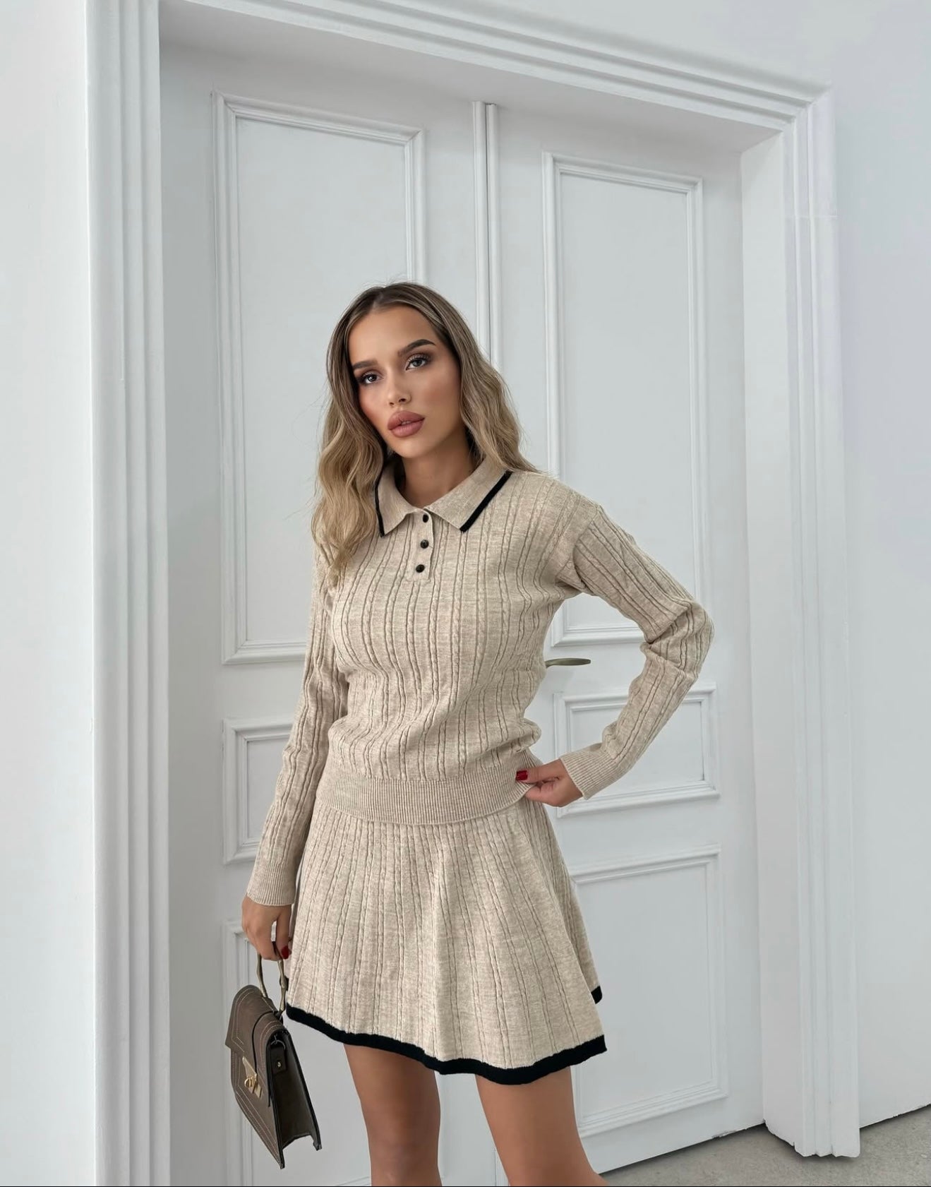 KNITTED POLO SUIT WITH A SKIRT